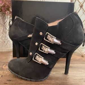 Black nubuck high-heeled booties with "ski-boot" buckles and lug sole size 7.5